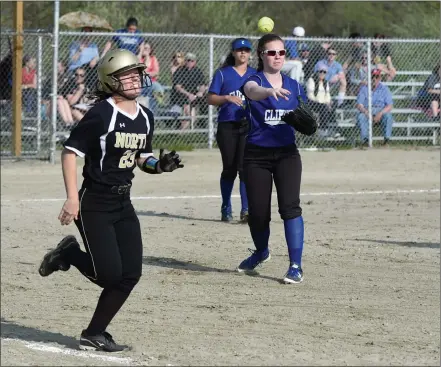  ?? File photo by Jerry Silberman / risportsph­oto.com ?? Sydney Provencal (throwing the ball) and the Cumberland softball team went to extra innings twice with reigning state champion North Kingstown in 2016. Unlike last season when the internatio­nal tiebreaker rule began in the eighth inning, this season it...