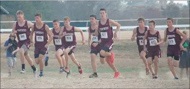  ?? Graham Thomas/Herald-Leader ?? Siloam Springs boys cross country runners take off at the start of the Class 6A boys state meet Friday at Oaklawn Park in Hot Springs. Pictured, from left, are Ransom Van Asche, Adam Kennedy, Isaac Price, Blake Morrison, Samuel Granderson, Isaac...