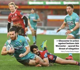  ?? Harry Trump/Getty Images ?? > Gloucester in action against bottom club Worcester – spared the threat of relegation