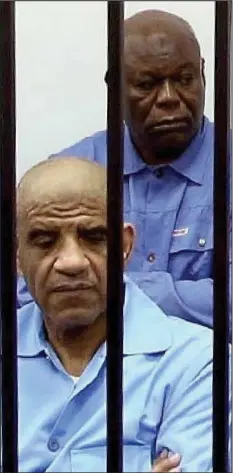  ??  ?? Suspects: Senussi, left, and Mas’ud in a Tripoli court in 2014