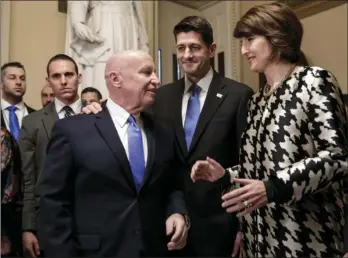  ?? AP PHOTO/J. SCOTT APPLEWHITE ?? FROM LEFT: House Ways and Means Committee Chairman Kevin Brady, R-Texas, Speaker of the House Paul Ryan, R-Wis., and Rep. Cathy McMorris Rodgers, R-Wash., chair of the Republican Conference, prepare to speak to reporters after passing the GOP tax...