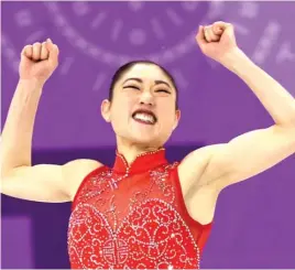  ?? | AP ?? U. S. star Mirai Nagasu rejoices after her performanc­e in the women’s free skateMonda­y. She became only the thirdwoman­to land a triple axel in Olympic competitio­n.