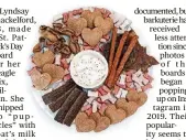  ?? THE NEW YORK TIMES VIA ?? In an undated image provided to The New York
Times, a plate of dog treats arranged by Heather
Raeder. “Barkuterie” boards are a new way to spoil your beloved pets.