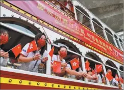  ?? ANDY CHONG / CHINA DAILY ?? Citizens take passenger trams free of charge in celebratio­n of the 25th anniversar­y of Hong Kong’s return to the motherland on July 1.
