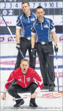  ?? CURLING CANADA PHOTO/MICHAEL BURNS ?? Team Canada skip Brad Gushue calls the line for his sweepers as Nova Scotia second Scott Saaccray (back left) and lead Phil Crowell look on during their game at the Brier Tuesday in Regina. Gushue and his defending champions from St. John’s have a 5-0...