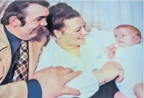  ??  ?? Well-known Bath grocers Tony and Lyn Eades, who have died within weeks of each other, pictured with son Mike as a baby; Below, their Crescent Lane shop