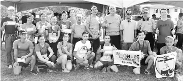  ??  ?? Mayor Yii (standing, fourth right), with Goh on his right, Salin (sixth right) and Samad (second right), join the top runners of the Lereng Bukit Staircase Challenge 2017 in a group photo.