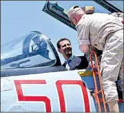  ?? AP ?? Syrian President Bashar Assad sits in a Russian SU-35 fighter Tuesday as he inspects Russia’s Hmeimim air base at Latakia in southeaste­rn Syria.