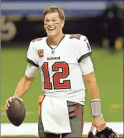  ?? AP - Brett Duke, file ?? Buccaneers quarterbac­k Tom Brady has maintained a goal of playing until he was at least 45 years old, something he can fulfill with his new contract.