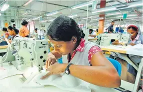  ??  ?? File picture of a garments factory worker.