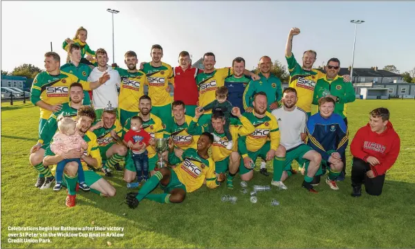  ??  ?? Celebratio­ns begin for Rathnew after their victory over St Peter’s in the Wicklow Cup final in Arklow Credit Union Park.