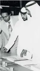  ?? ?? Planning an airport
Left: Shaikh Khalifa reviews a model
of the Abu Dhabi airport road plan in 1980 in the presence of Shaikh Ahmad Bin Hamed, then Minister of Informatio­n and Culture and Dr Mana Saeed Al Otaiba, then Minister of Petroleum and Mineral Resources.