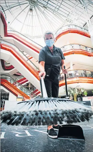  ?? Picture: Andrew Cawley ?? Princes Square cleaner Katarzyna Sztubecka working to get the Glasgow shopping centre ready to open its doors tomorrow as malls around Scotland get back in business. A spokespers­on for the centre in Buchanan Street, one of Scotland’s busiest shopping destinatio­ns, said: “The countdown to shoppers and diners returning to the centre is now in full swing.”