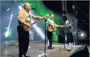  ??  ?? The Wolfe Tones and (below) Boyzone performing at this year’s Feile
