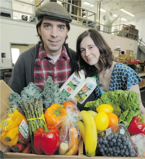  ?? Bruce Edwards/ Edmonton Journal ?? Danny and Miranda Turner own the Organic Box, a grocery-delivery company in Edmonton that delivers organic produce and meats.