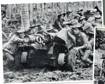  ??  ?? TOP Australian-made 25 pounder being manhandled through the mud at Langemak Bay New Guinea