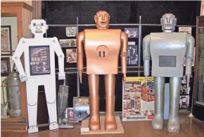  ?? ?? From left, Herbert Televox, a replica of Elektro and Elektro himself stand inside the Mansfield Memorial Museum.