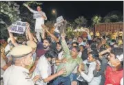  ?? PTI ?? Delhi Congress workers protest outside Kapil Sibal’s residence in New Delhi on Wednesday.