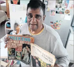  ?? PICTURE: DUNCAN GUY ?? MAGAZINE MAN: Vassie Reddy is surrounded by old movie magazines he has collected over the years, including the Weekend magazine with a story of a ship’s sinking which he believes could be the basis of a good movie.