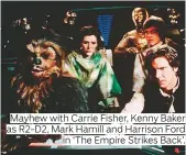  ??  ?? Mayhew with Carrie Fisher, Kenny Baker as R2-D2, Mark Hamill and Harrison Ford in ‘The Empire Strikes Back’.