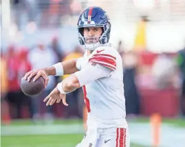  ?? KYLE TERADA/USA TODAY SPORTS ?? Giants quarterbac­k Daniel Jones warms up before a game last season against the San Francisco 49ers.