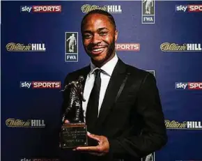  ??  ?? Raheem Sterling beat Virgil Van Dijk by over 100 votes to win the Football Writers’ Associatio­n Footballer of the Year award.