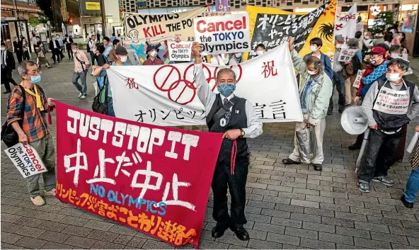  ?? GETTY IMAGES ?? A protest in Tokyo this week against the Olympic Games, which are due to start on July 23. Concerns linger over the feasibilit­y of hosting such a huge event during the Covid-19 pandemic, with polls indicating that most Japanese people do not want the Games to go ahead.
