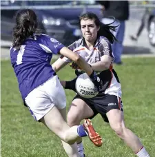  ??  ?? Sligo’s Anne Marie Coleman attempts to stop the progress of Shiela Reilly of Cavan.