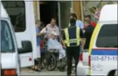  ?? DAVID SANTIAGO — MIAMI HERALD VIA AP ?? In this Wednesday photo, Patients are evacuated from Krystal Bay Nursing and Rehabilita­tion Center Wednesday after losing power in the aftermath of Hurricane Irma, in North Miami Beach.