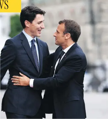  ?? JUSTIN TANG / THE CANADIAN PRESS ?? U.S. President Donald Trump will meet one-on-one with both Canadian Prime Minister Justin Trudeau and French President Emmanuel Macron at this week’s G7 summit in Charlevoix, Que., according to Larry Kudlow, Trump’s new economic adviser.