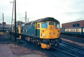  ?? ?? Twin-headlight fitted No. 26041 at Inverness on May 15, 1984. There were a lot of detail difference­s that could be observed between Class 26s with regard to patching, headlights and other front end details in the late 1970s and early 1980s.