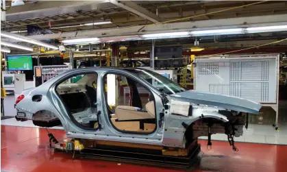  ?? ?? A Mercedes-Benz C-Class frame moves down the production line at a factory in Alabama. Photograph: Andrew Caballero-Reynolds/AFP/ Getty Images