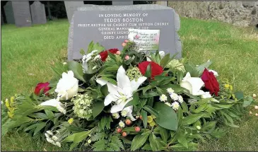  ??  ?? A floral tribute laid at the grave of the Reverend Teddy Boston, Rector of Cadeby and manager of the Cadeby Light Railway