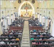  ?? AFP ?? Sri Lankan Catholic devotees pray at the St Theresa's church in the first regular mass since the Easter attacks.