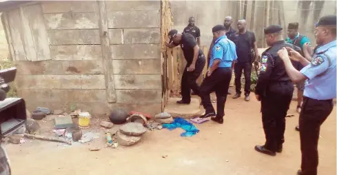  ?? Photo: Lagos Govt. House ?? Lagos State Police Commission­er, Edgal Imohimi (2nd left), being led into the shrine of a suspected Badoo Chief Herbalist, Fatai Adebayo alias Alese, after his arrest at Imosan Village in Ijebu-Ode of Ogun State yesterday