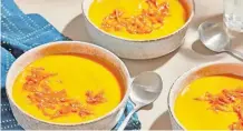  ?? The Washington Post TOM MCCORKLE, GINA NISTICO ?? CARROT cashew soup with miso and sesame. | styling