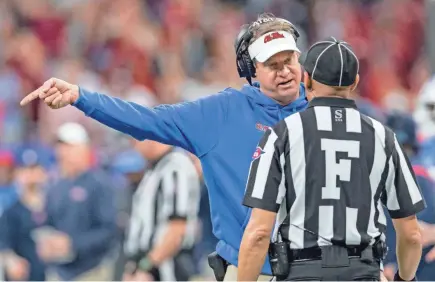  ?? MATTHEW HINTON/AP ?? Mississipp­i coach Lane Kiffin argues a call during the Sugar Bowl against Baylor on Jan. 1 in New Orleans. Rebels quarterbac­k Matt Corral was injured in the first quarter of the game, which Baylor won 21-7.