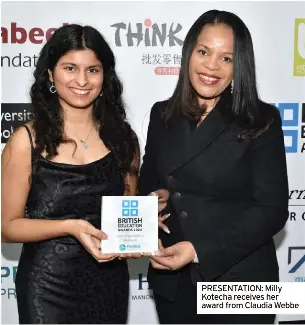  ?? ?? PRESENTATI­ON: Milly Kotecha receives her award from Claudia Webbe