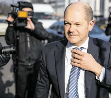  ?? BILD: SN/AP ?? Hüter der Kasse: Als Finanzmini­ster wird der SPDPolitik­er Olaf Scholz künftig eine Schlüssels­tellung im Kabinett der Großen Koalition (GroKo) haben.