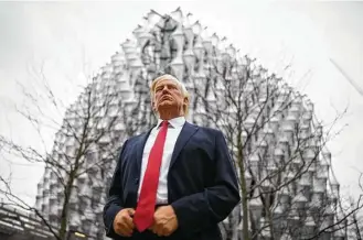  ?? Leon Neal / Getty Images ?? After President Donald Trump canceled his visit to the new U.S. Embassy in London, Madame Tussauds “stepped in,” and placed a model of him there, the wax museum tweeted.