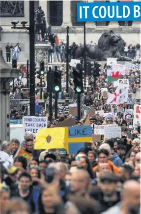  ??  ?? ■ Anti-maskers and those who would like to see coronaviru­s restrictio­ns thronged London streets to make their point