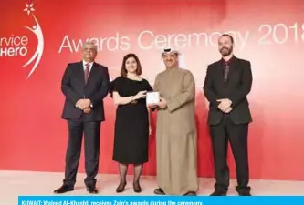  ??  ?? KUWAIT: Waleed Al-Khashti receives Zain’s awards during the ceremony.