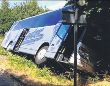  ?? Picture: Mick Gould’s Commercial­s Ltd ?? A coach with tourists from Belgium suffered a brakes failure on the M20 motorway. The driver managed to get the coach off the motorway and into a country road where it then crashed into a ditch