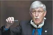 ?? ANDREW HARNIK/AP ?? National Institutes of Health Director Francis Collins says several COVID-19 vaccines in testing look promising.