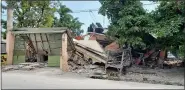  ?? DELOT JEAN — THE ASSOCIATED PRESS ?? The Cayimite Hotel is damaged after an earthquake Aug. 14 in Les Cayes, Haiti.