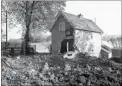  ??  ?? The Lodge House at the entrance to Oakwood Park, Maidstone, damaged by a raid in October, 1940