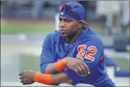  ?? JULIE JACOBSON - THE ASSOCIATED PRESS ?? FILE - In this July 20, 2018, file photo, New York Mets’ Yoenis Cespedes stretches before a baseball game against the New York Yankees in New York. When baseball comes back next month, Cespedes might finally be ready to return, too. Sidelined for nearly two years by injuries and then the coronaviru­s pandemic, the Mets slugger could be healthy enough at last to play on opening day in late July — especially with the designated hitter available in the National League this season. General manager Brodie Van Wagenen said Monday, June 29, 2020, the team is optimistic about Céspedes.