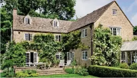  ??  ?? Family nest: The picturesqu­e £1.5m cottage in Cotswolds