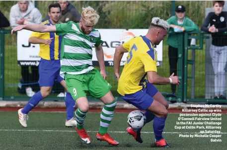  ?? Photo by Michelle Cooper Galvin ?? Stephen McCarthy Killarney Celtic up wins possession against Clyde O’Connell Fairview United in the FAI Junior Challenge Cup at Celtic Park, KIllarney on Saturday.