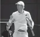  ?? Oli Scarff, Getty Images ?? Kevin Anderson exults after winning the fourth set against Roger Federer on Wednesday.